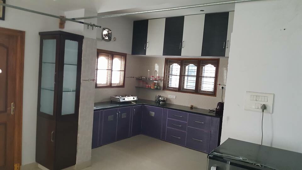 L shaped kitchen with kitchen cabinets by Shiva Interiors Modular-kitchen Minimalistic | Interior Design Photos & Ideas