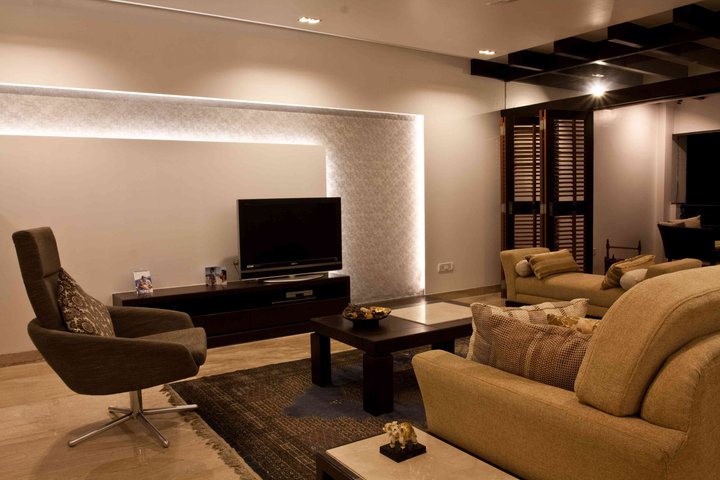 Wood and Caramel living Room by Dinsignia Architects And Interiors Living-room Modern | Interior Design Photos & Ideas