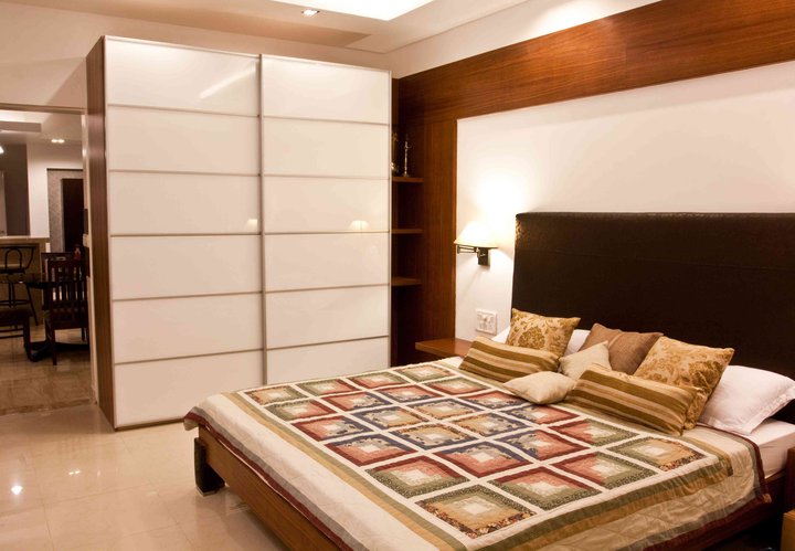 Gold and White Master bedroom by Dinsignia Architects And Interiors Bedroom Modern | Interior Design Photos & Ideas