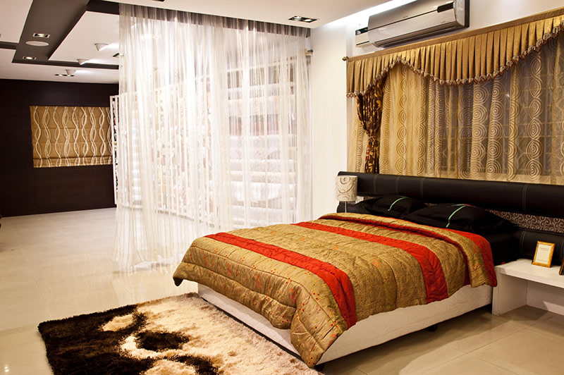Red and gold Bedroom by Dinsignia Architects And Interiors Bedroom Modern | Interior Design Photos & Ideas