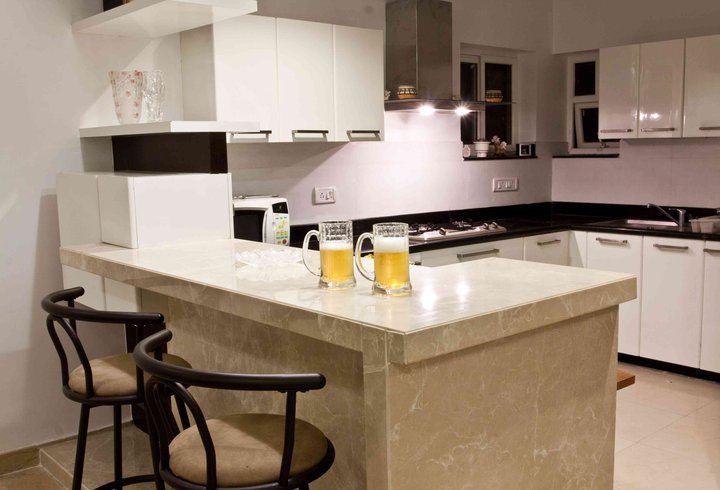 Mocha Theme Modular Kitchen by Dinsignia Architects And Interiors Modular-kitchen Modern | Interior Design Photos & Ideas