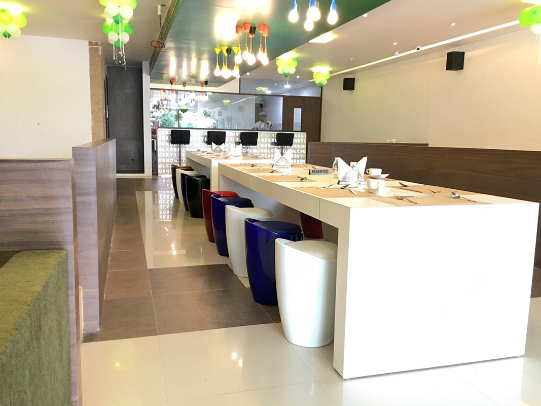 Restaurant with colourful lights by Jai Patel Contemporary | Interior Design Photos & Ideas