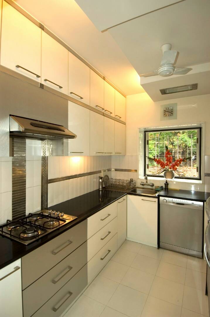 Kitchen With Pale Shade Cabinets by Nikeeta Mehta Modular-kitchen Modern | Interior Design Photos & Ideas