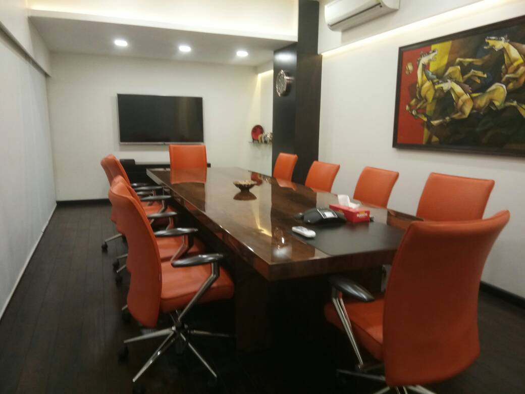 Meeting Room With Orange Shade Chairs by Nikeeta Mehta Modern | Interior Design Photos & Ideas