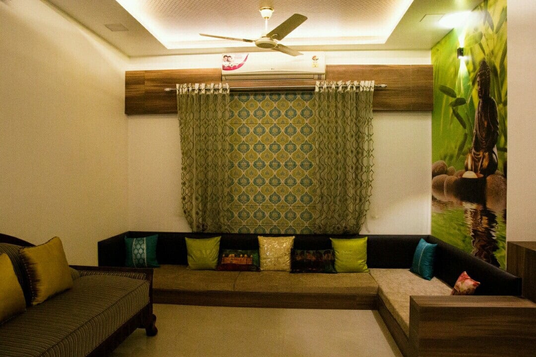L shape sofa with colored cushions and artistic wall art by Bhagyashree Prajapati Living-room Contemporary | Interior Design Photos & Ideas
