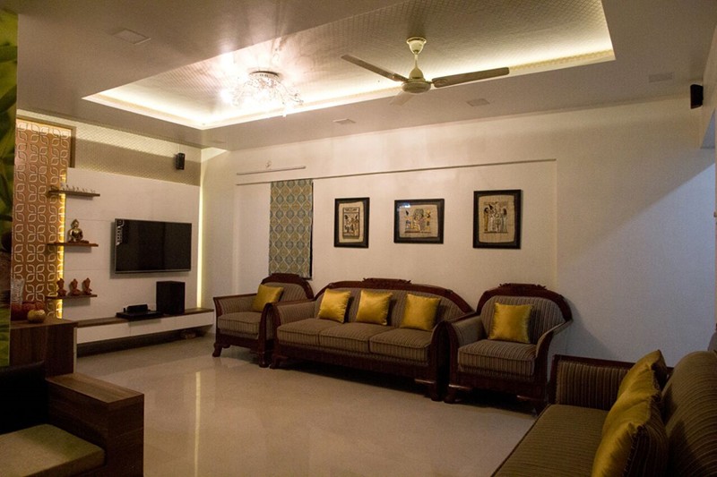 Living room with brown sofa and marble flooring with false ceiling by Bhagyashree Prajapati Living-room Modern | Interior Design Photos & Ideas
