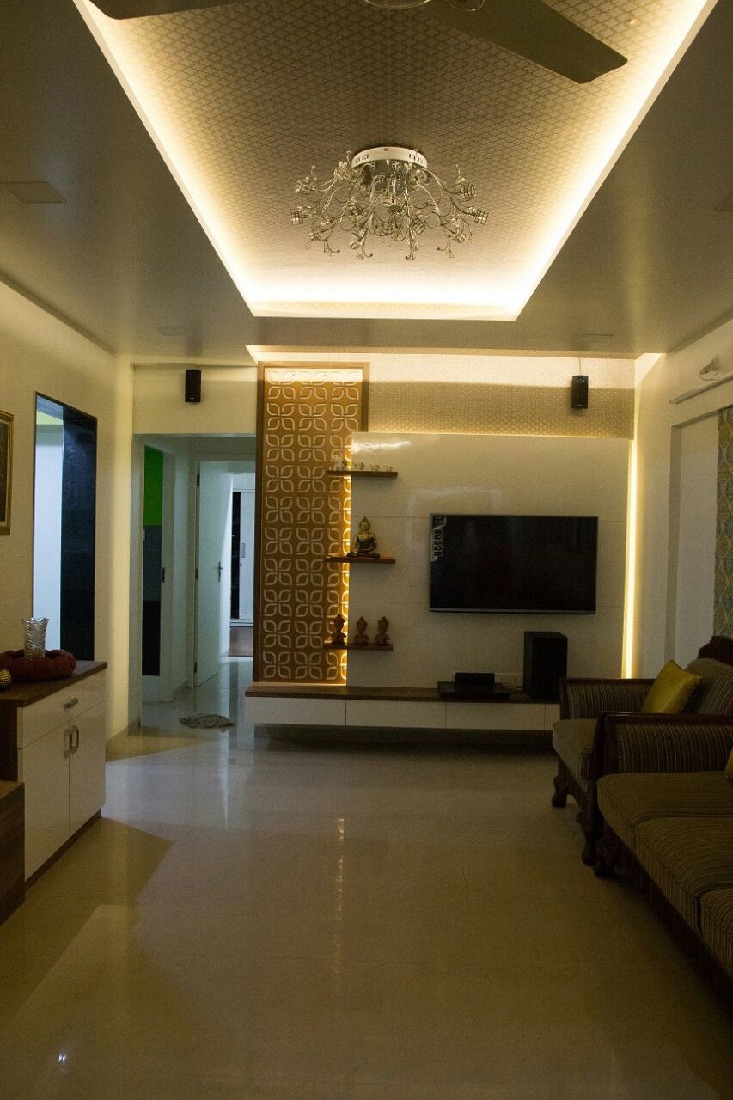 Living room with false ceiling and marble flooring with display unit by Bhagyashree Prajapati Living-room Modern | Interior Design Photos & Ideas
