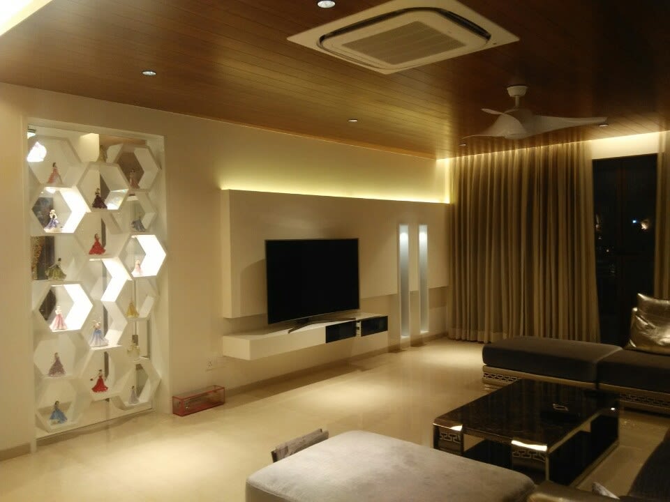 Tv unit and false ceiling in Living room with black sofa by Interior Elements Living-room Modern | Interior Design Photos & Ideas