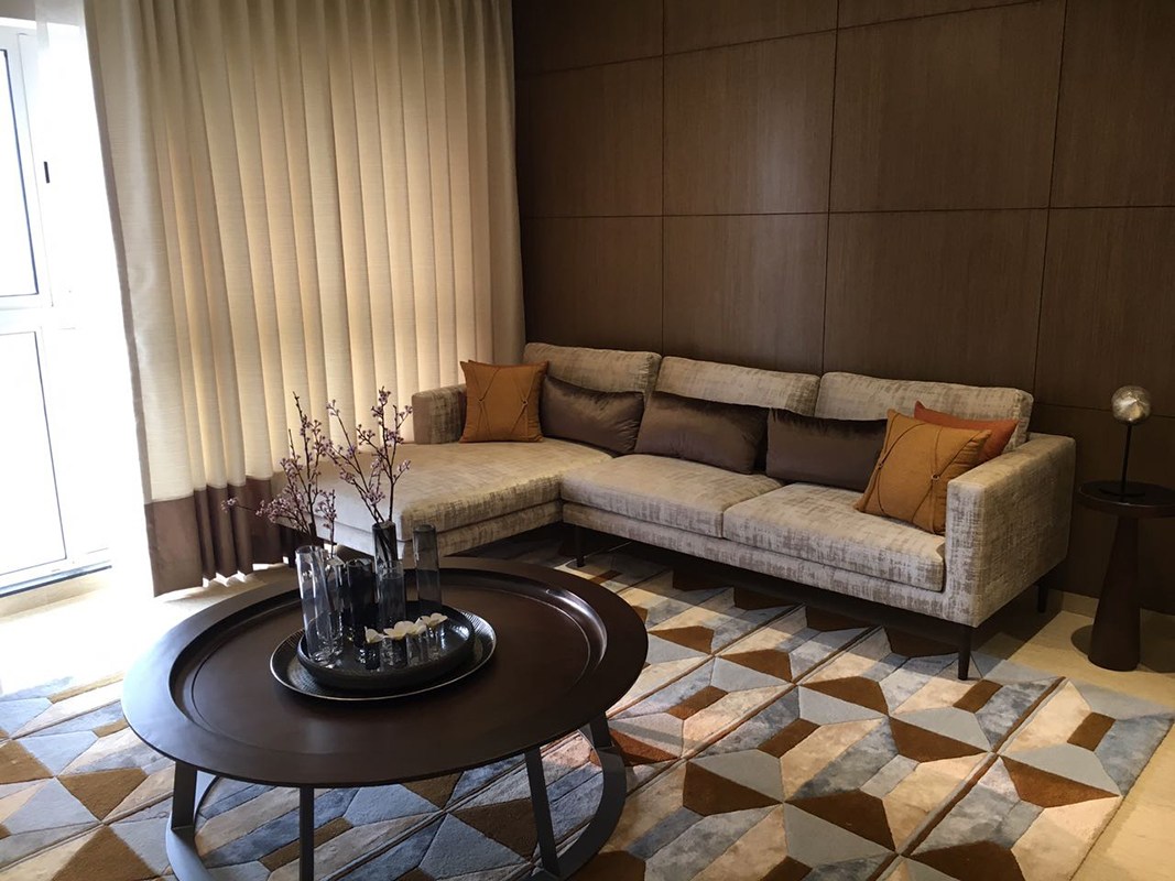 L shaped sectional with wooden panel by Jitesh Dhoka Contemporary | Interior Design Photos & Ideas