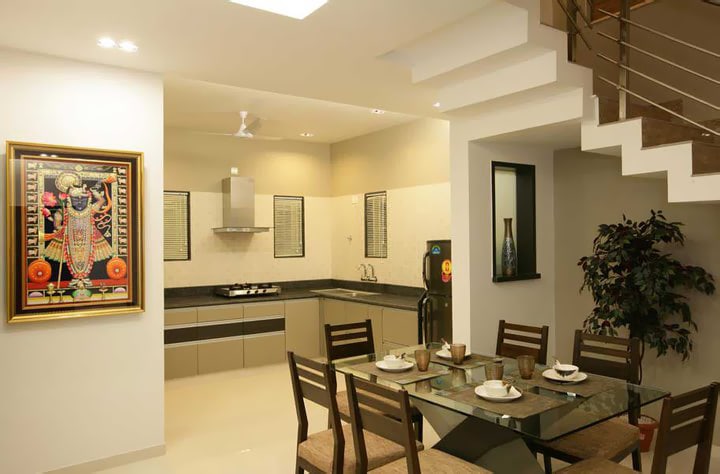 Open kitchen with dining area by Jitesh Dhoka Modern | Interior Design Photos & Ideas