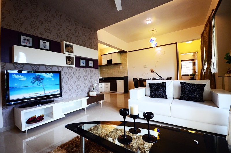 Living room with open kitchen by Jitesh Dhoka Modern | Interior Design Photos & Ideas