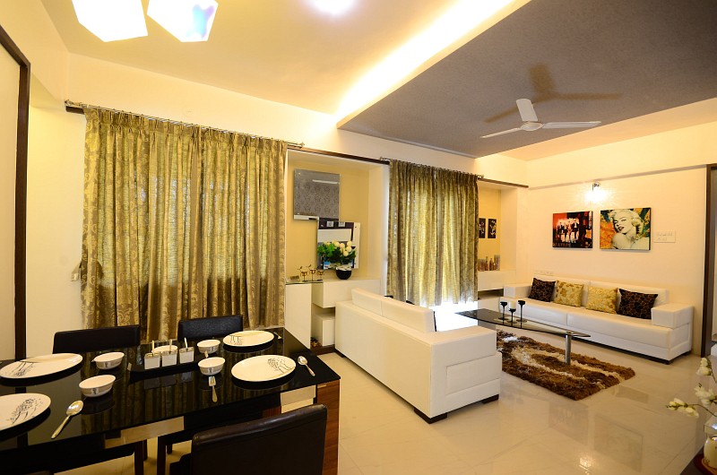 Living room with dining area by Jitesh Dhoka Modern | Interior Design Photos & Ideas