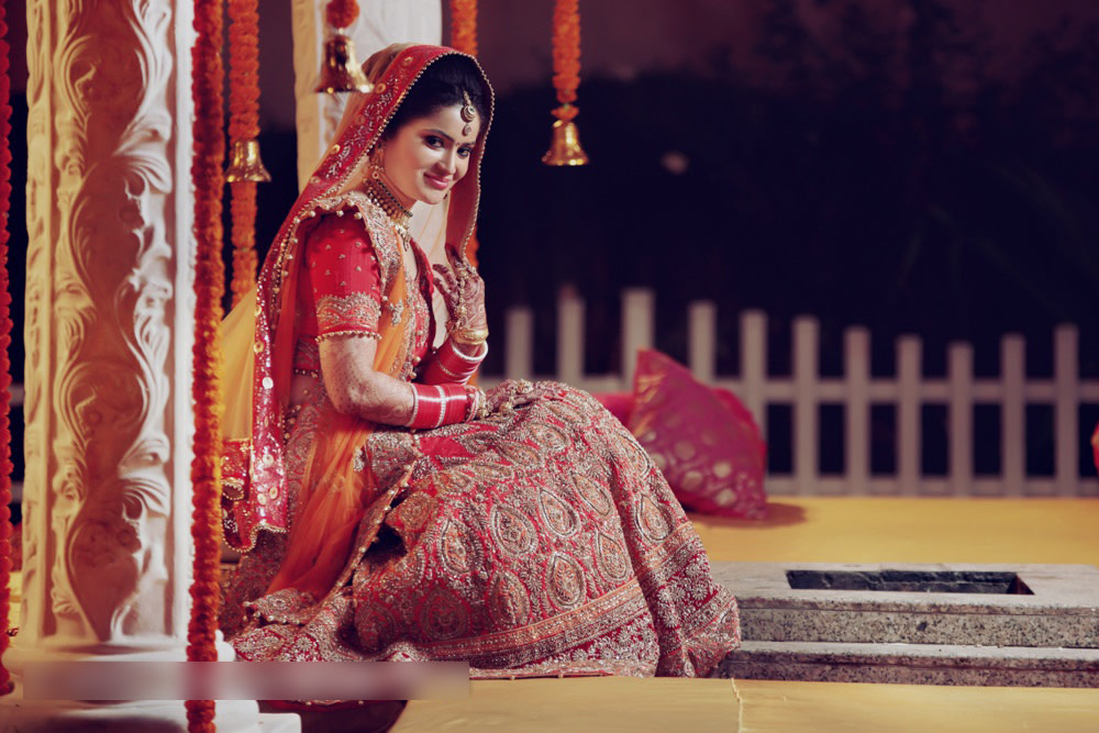 Delicate Gold Work On A Red Lehenga For The Bride by Mohit Wedding-photography Wedding-dresses | Weddings Photos & Ideas