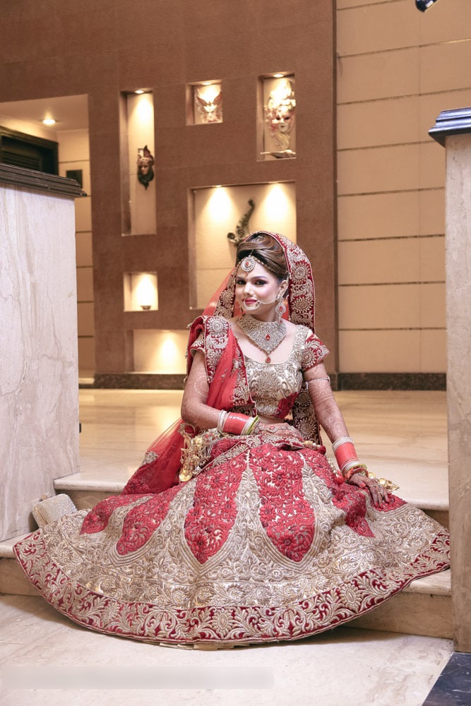 Ravishing Bride In Red ANd Gold Embroidered Lehenga by Mohit Wedding-photography Wedding-dresses | Weddings Photos & Ideas