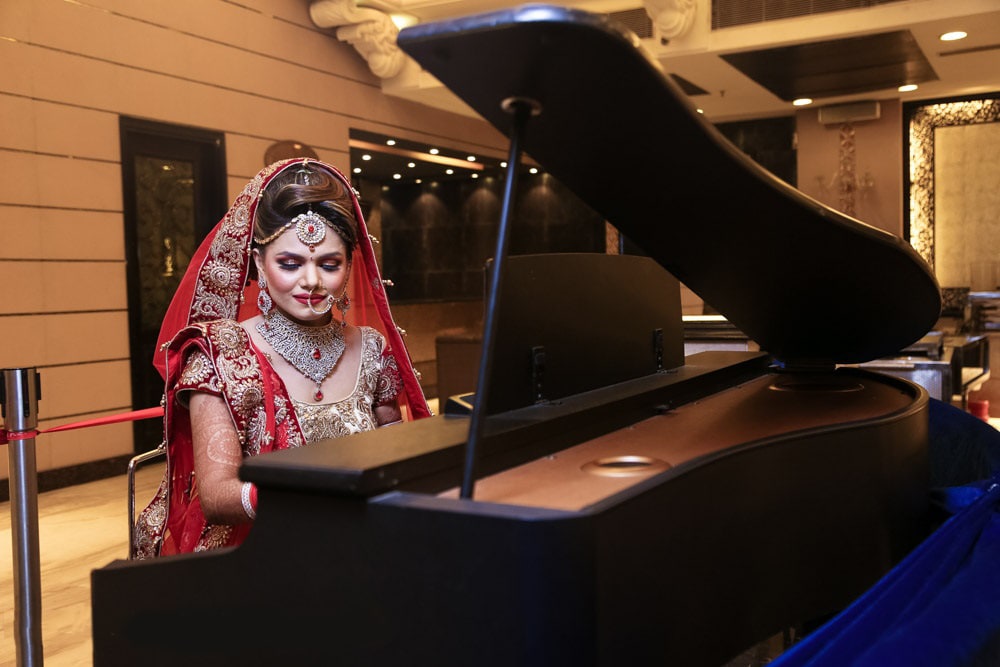 Bride Adorning Diamond Jewels Playing On Piano by Mohit Wedding-photography | Weddings Photos & Ideas
