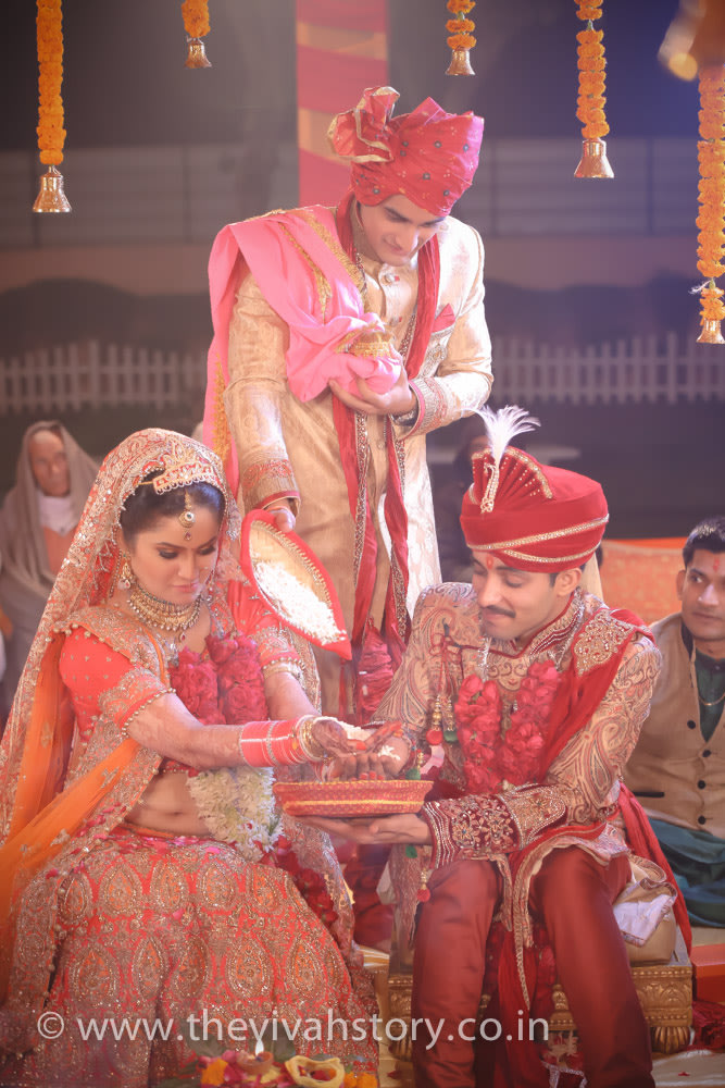 Couple Performing Wedding Rituals by Mohit Wedding-photography | Weddings Photos & Ideas