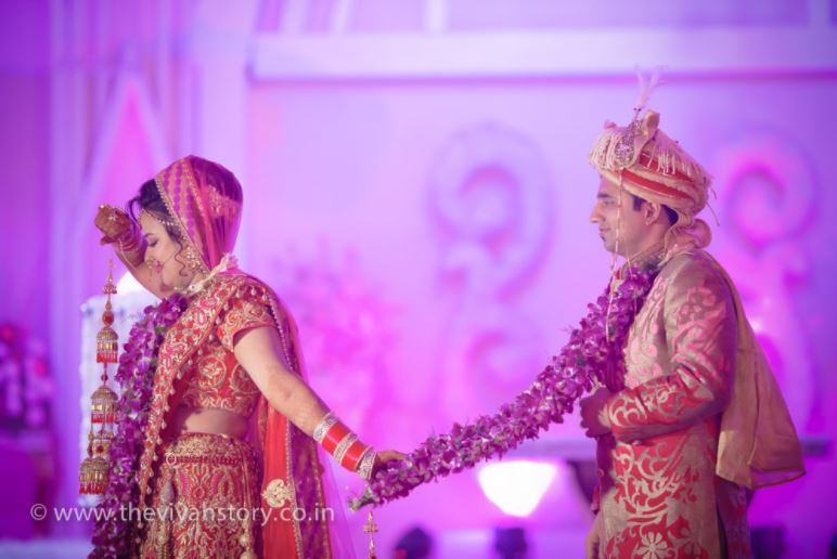 Filmy Shot Of The Couple by Mohit Wedding-photography Bridal-jewellery-and-accessories Groom-wear-and-accessories | Weddings Photos & Ideas