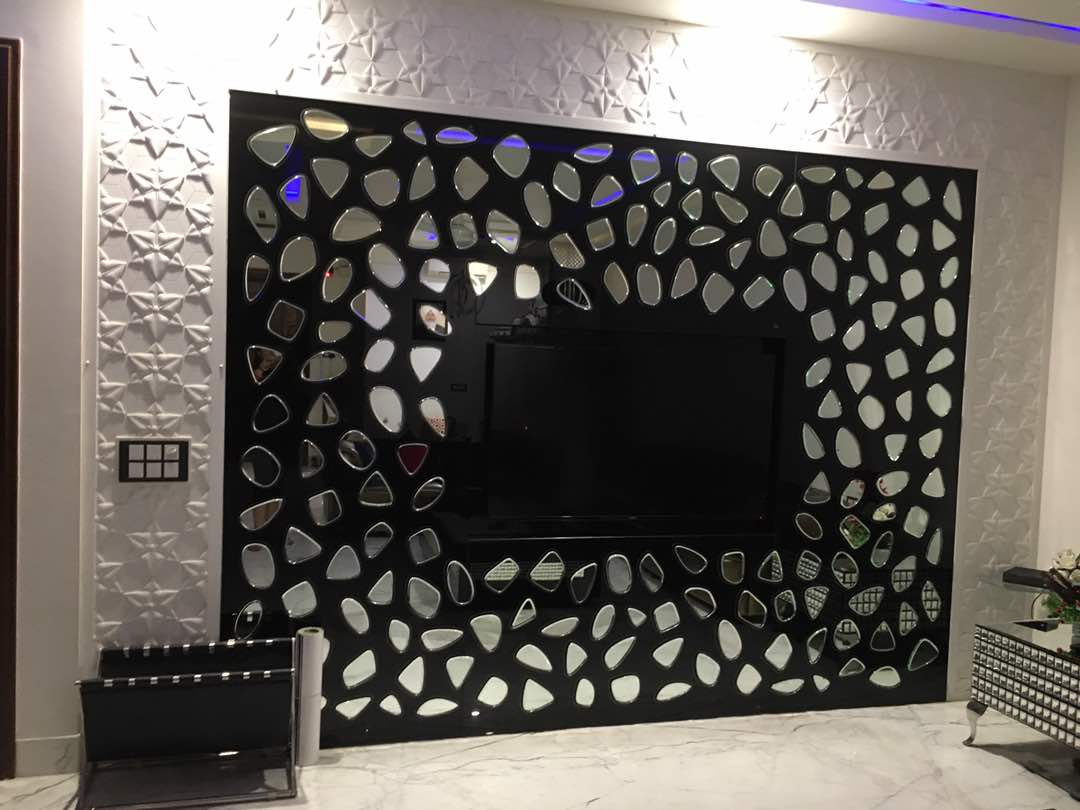 living room wall design by Aashna Jain Modern | Interior Design Photos & Ideas