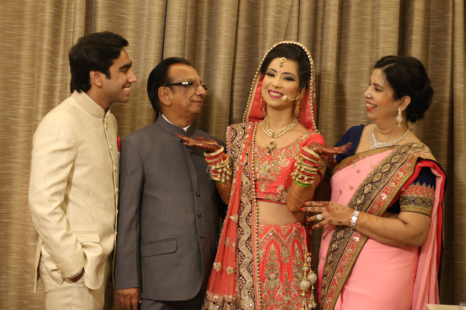 Bride and Her Family Strike a Happy Pose by Amit Kumar Wedding-photography | Weddings Photos & Ideas