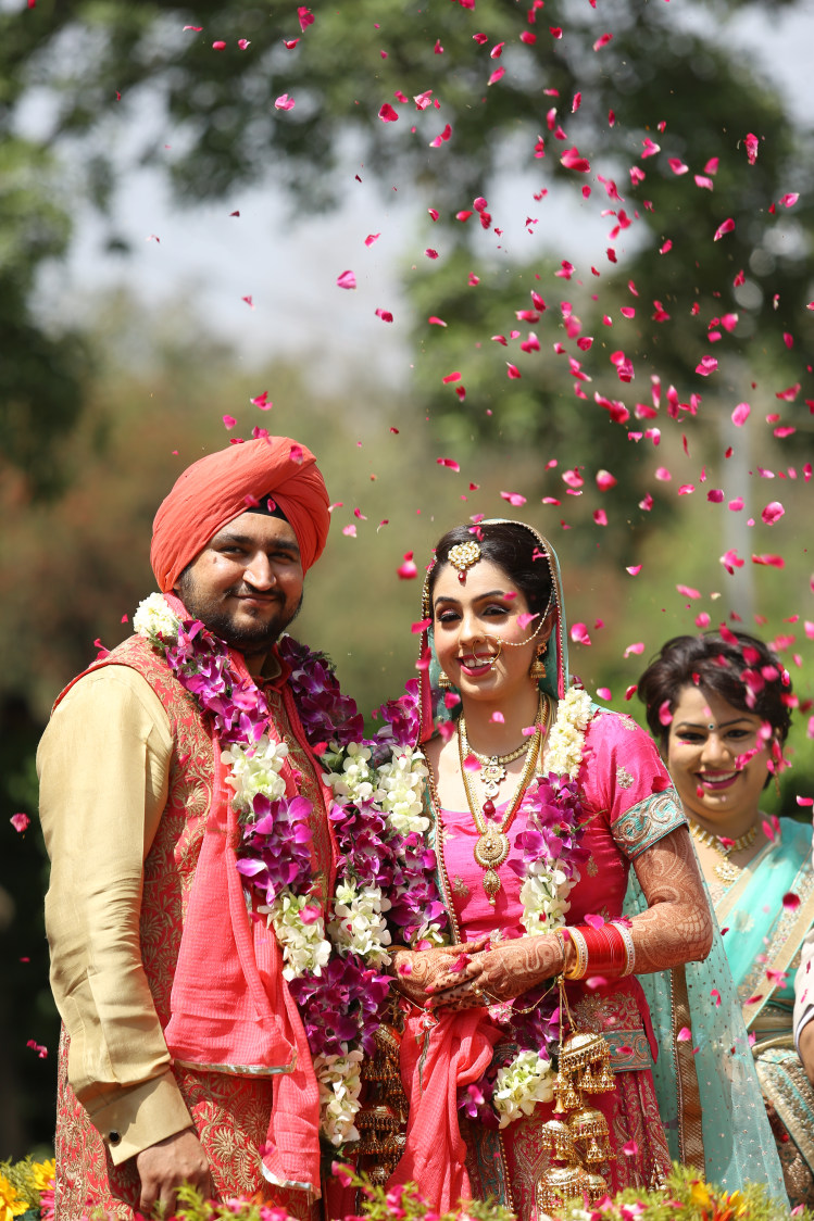 Bride and Groom in a Celebratory Mood During Their Wedding Day by Amit Kumar Wedding-photography | Weddings Photos & Ideas
