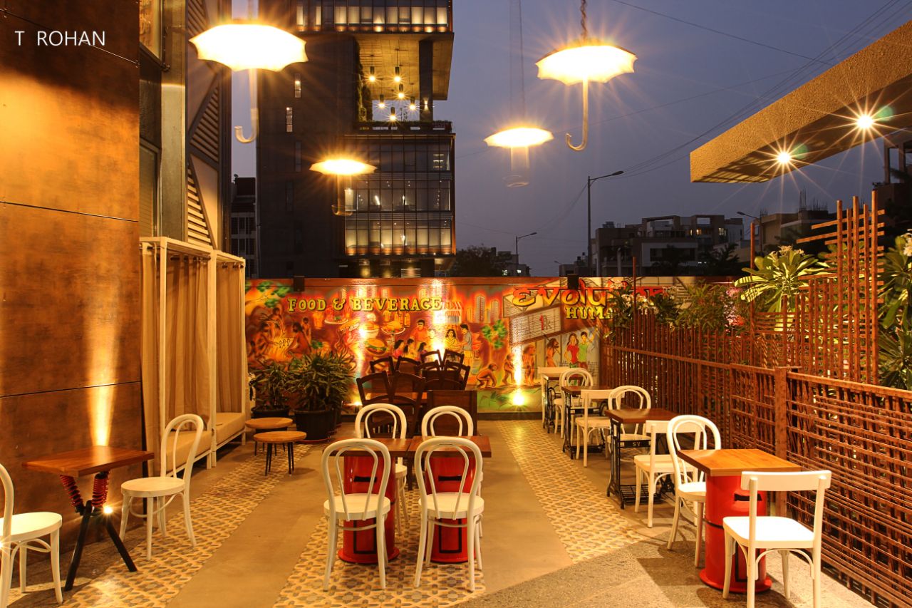 Open dining by Rohan Tapkire Modern | Interior Design Photos & Ideas