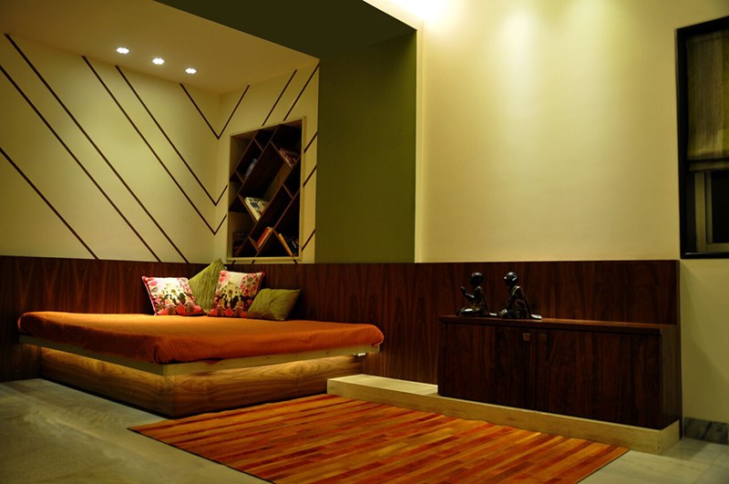 Buff Shaded Bedroom With Textured Wall by Chaitali D Parikh Bedroom Contemporary | Interior Design Photos & Ideas