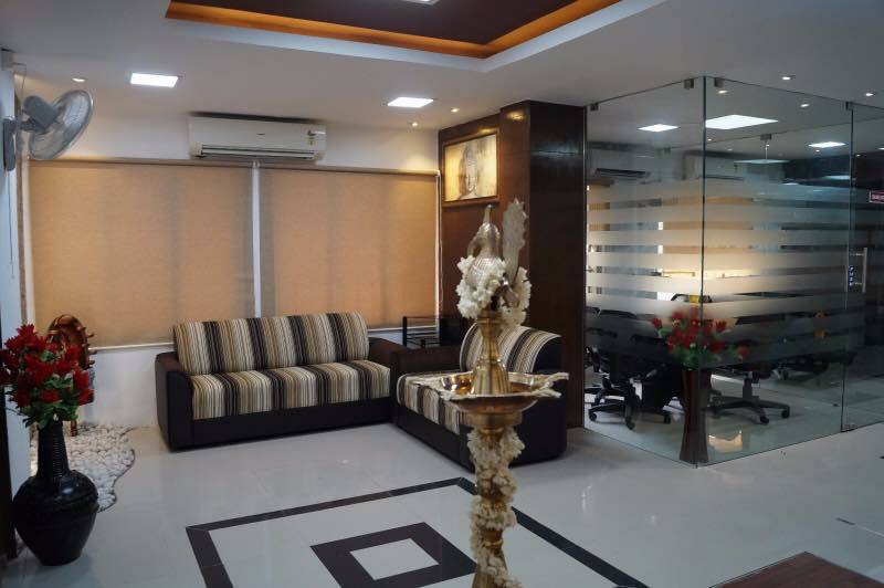 Waiting room with false ceiling and lavish sofa by Ganesh Modern | Interior Design Photos & Ideas