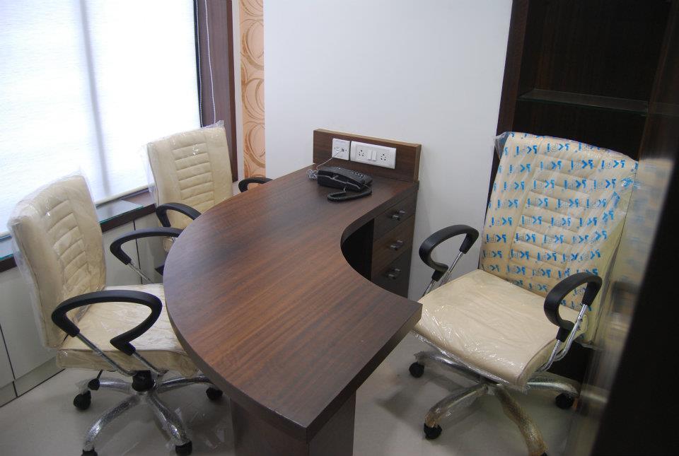 Curved Wooden Office Setup by Nilesh V. Gosavi Minimalistic | Interior Design Photos & Ideas