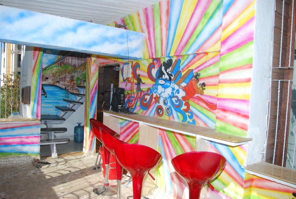 Pop Colored cafe sitting area by Nilesh V. Gosavi Modern | Interior Design Photos & Ideas