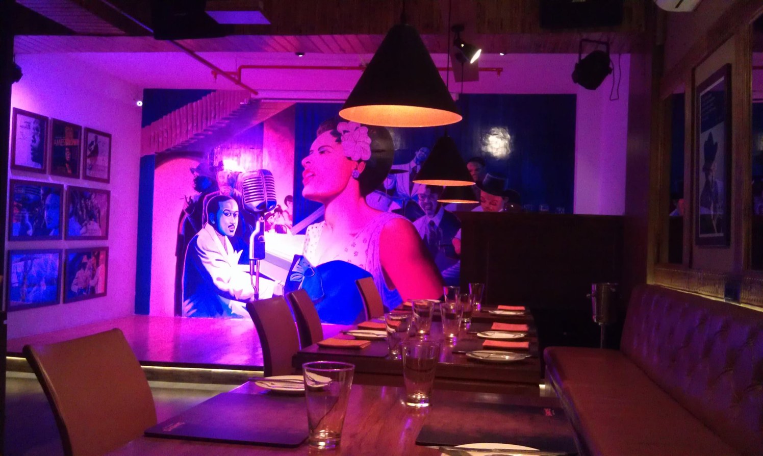 Artistic Restaurant with interactive Wall Art and Hanging Conical Lights by Mayank Manchanda Contemporary | Interior Design Photos & Ideas