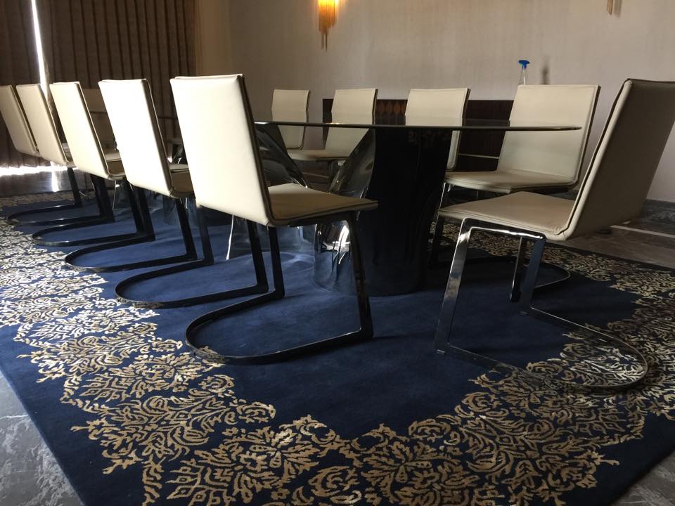 Conference Room with Black Table and Beige Chairs with Royal Blue Carpet by Mayank Manchanda Modern | Interior Design Photos & Ideas