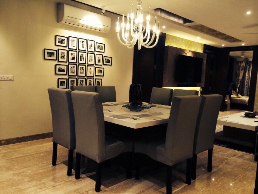 Beige Dining Room With Black Dining Chairs by Saurabh Garg Dining-room Contemporary | Interior Design Photos & Ideas