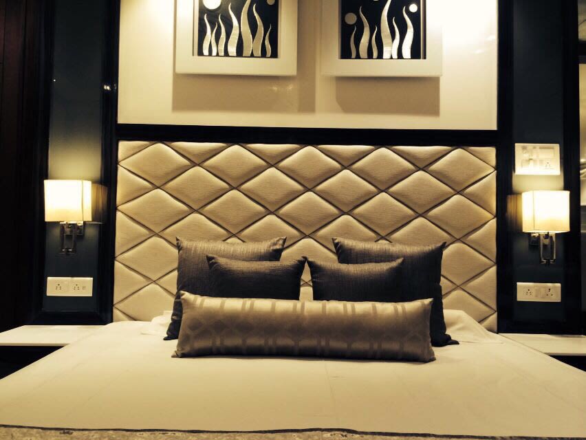 Copper Shaded Modern Bedroom With Copper Cushions by Saurabh Garg Bedroom Contemporary | Interior Design Photos & Ideas