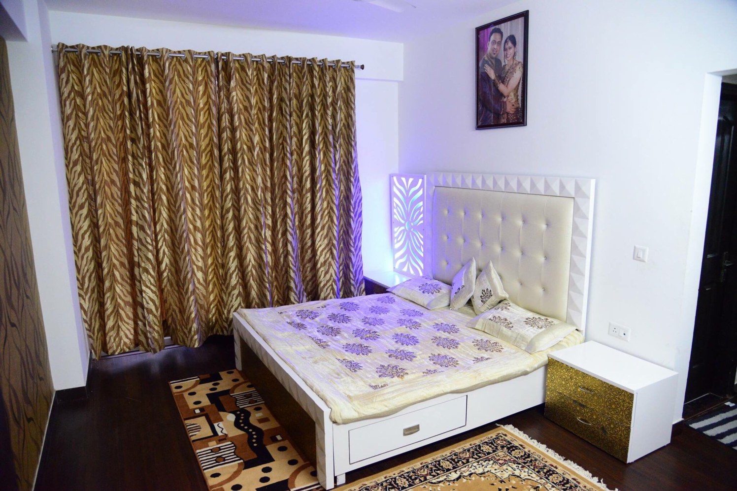 White Pearly Bedroom With Gold Curtains by Saurabh Garg Bedroom Contemporary | Interior Design Photos & Ideas