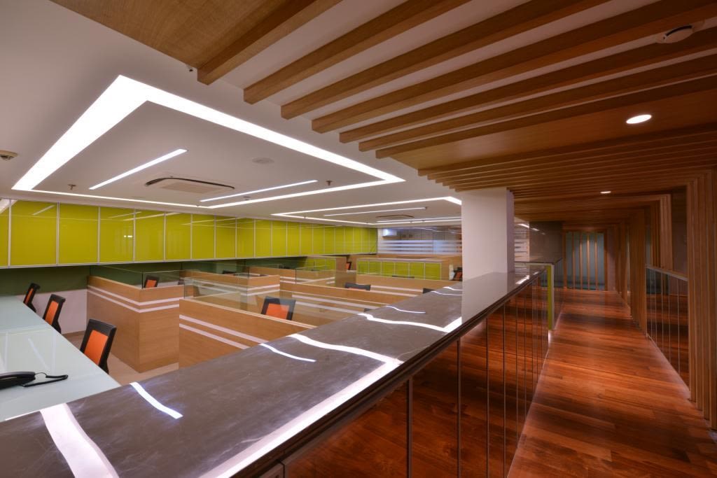 Open Office Space With Wooden Furnishing by Jeetan Ranpura Contemporary | Interior Design Photos & Ideas