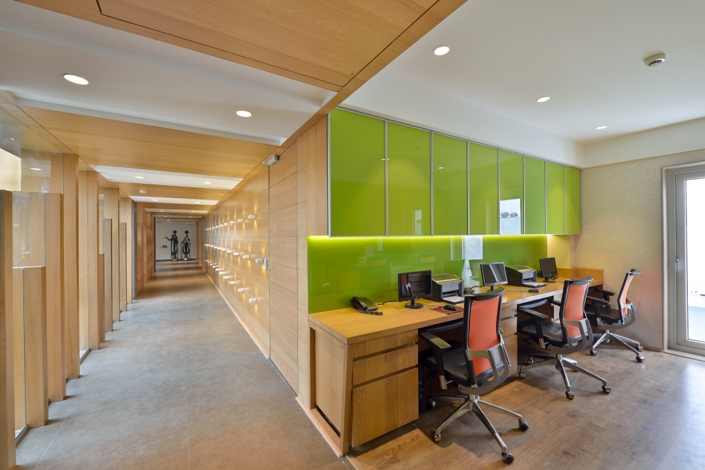 Green Cabinets And Wooden Desk In Office by Jeetan Ranpura Contemporary | Interior Design Photos & Ideas