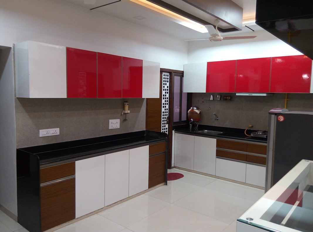 Red Modular Kitchen by Jigar Patel