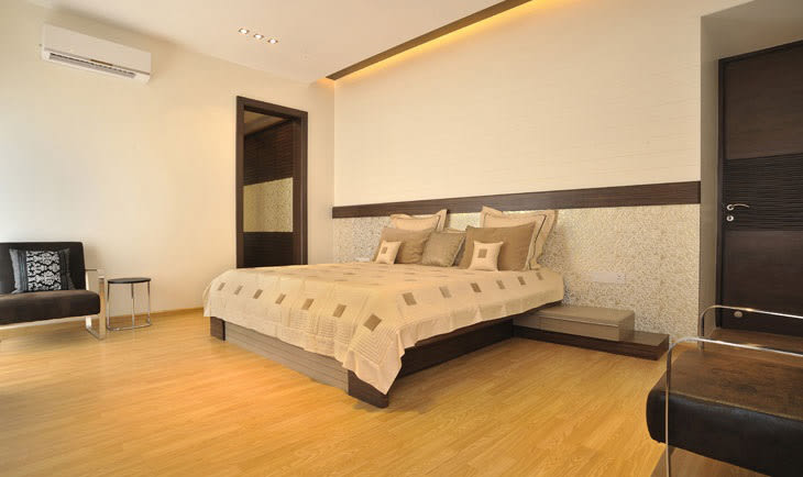 Low Rise Wooden Bed And Black Sofa by Deepti Srivastava Bedroom Contemporary | Interior Design Photos & Ideas