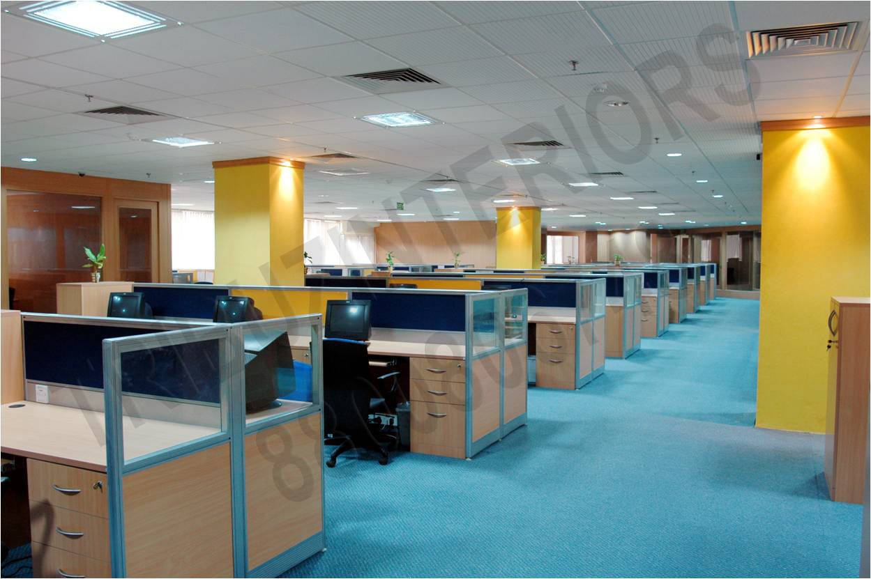 Modern Office Room With Wooden Desks And Blue Floor Carpet by Tribuz Interiors Pvt. Ltd. Modern | Interior Design Photos & Ideas