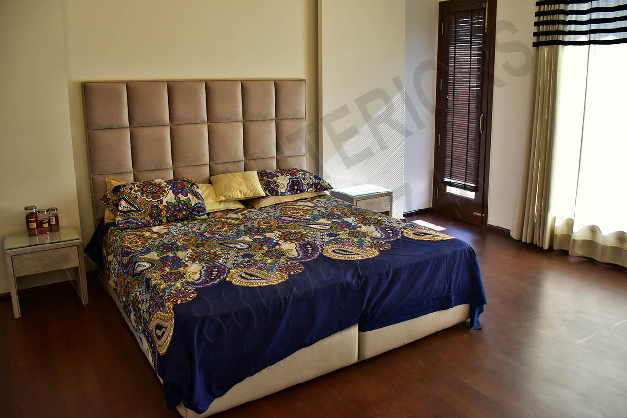 Master Bedroom With Cushioned Bed And Wooden Floor by Tribuz Interiors Pvt. Ltd. Bedroom Contemporary | Interior Design Photos & Ideas