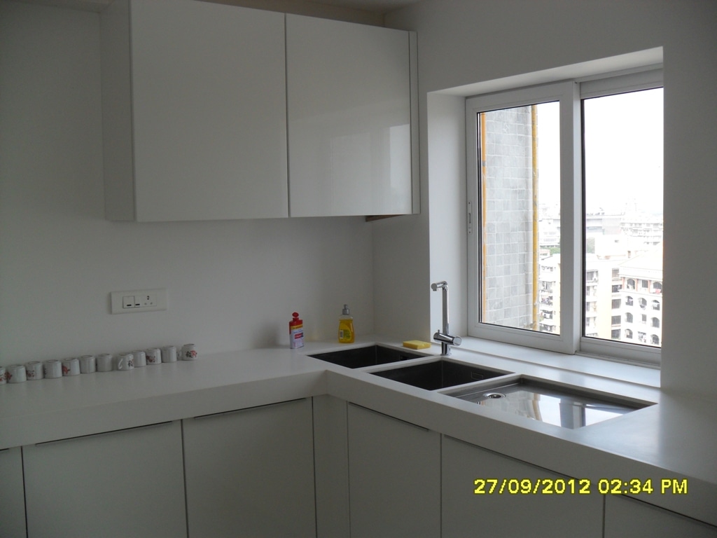 White and Classy Kitchen by Sadashiv Sataji