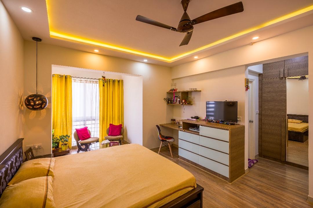 Contemporary bedroom with wooden flooring by Shubhashis Shomil Bedroom Contemporary | Interior Design Photos & Ideas