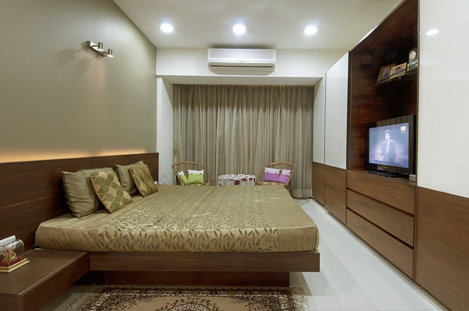 Bedroom with wardrobe tv unit and marble flooring by Milind Kapadia Bedroom Contemporary | Interior Design Photos & Ideas