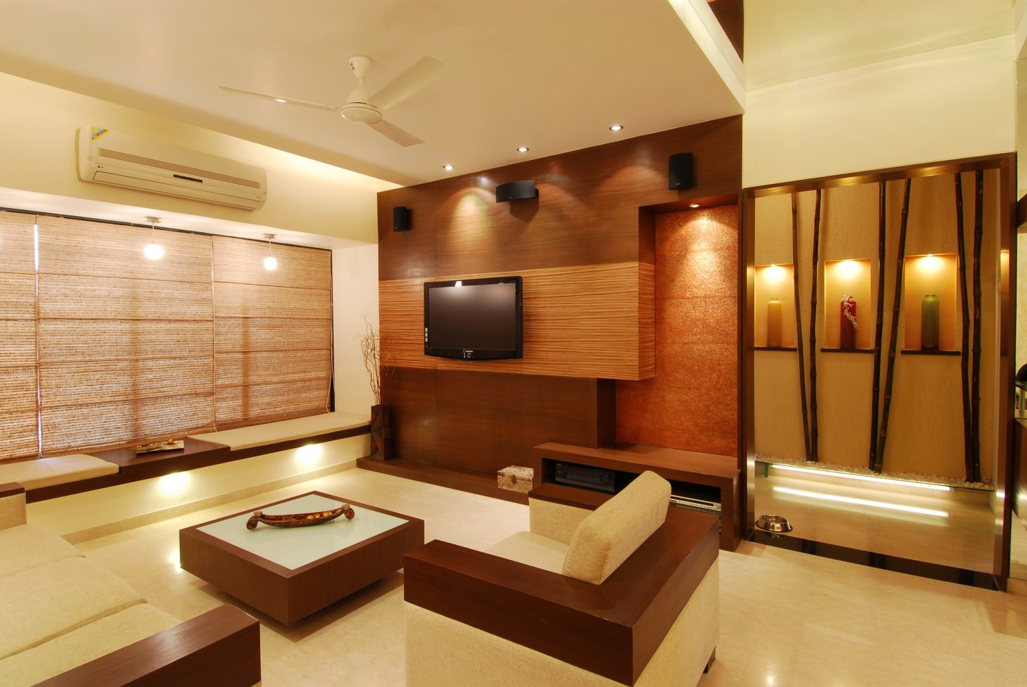 Living area with creamy sofa and modern display by Milind Kapadia Living-room Modern | Interior Design Photos & Ideas
