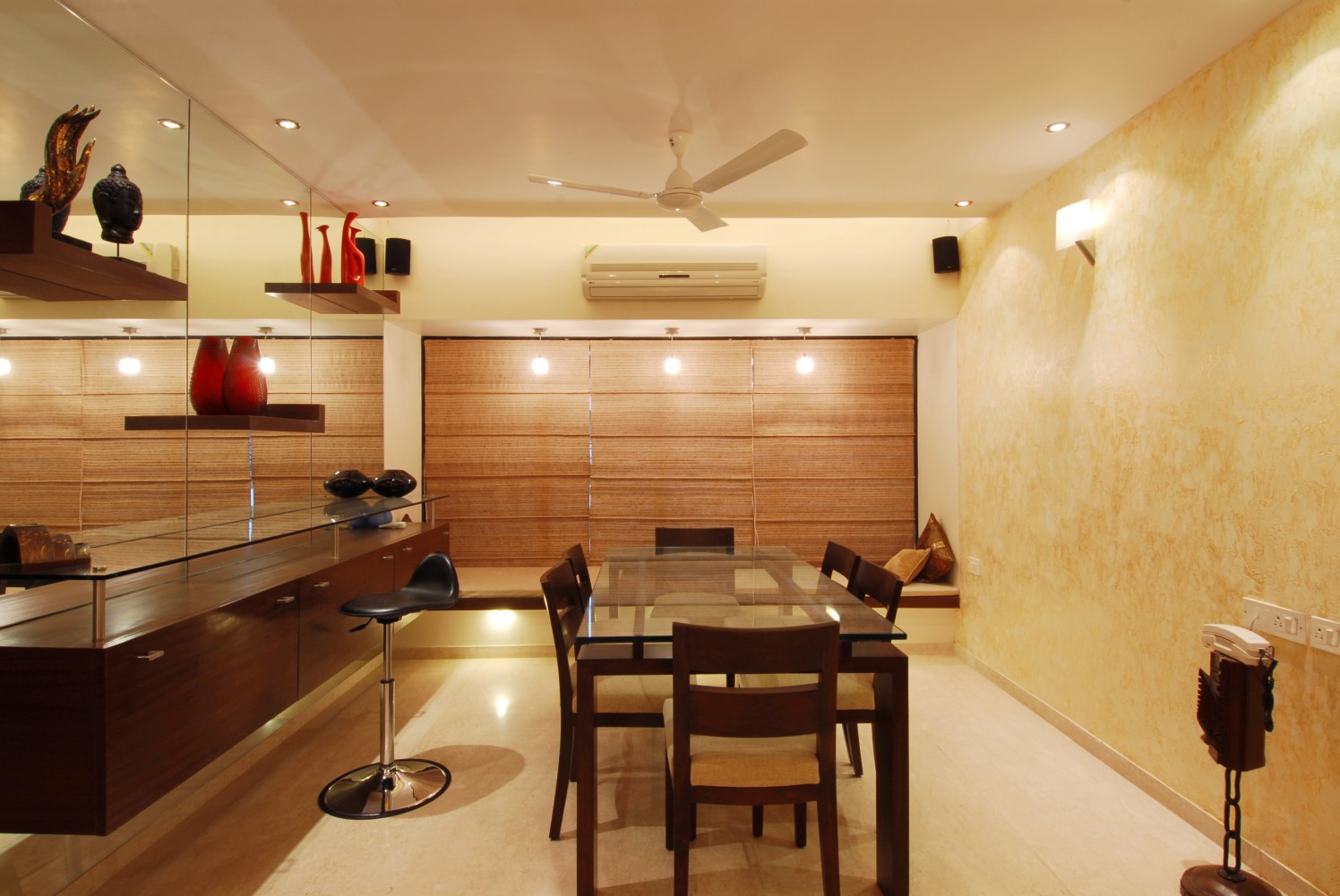 Dinning space with marble flooring and display unit by Milind Kapadia Dining-room Contemporary | Interior Design Photos & Ideas