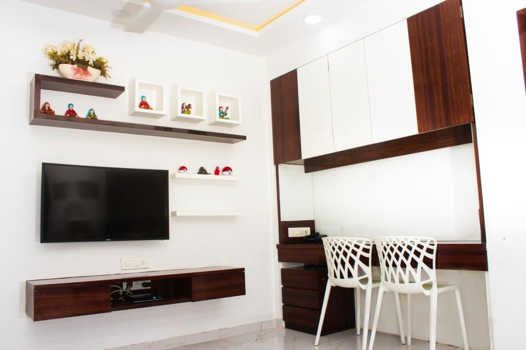 White And Brown Study And Entertainment Unit In Bedroom by VERSATILE INTERIORS Living-room Modern | Interior Design Photos & Ideas