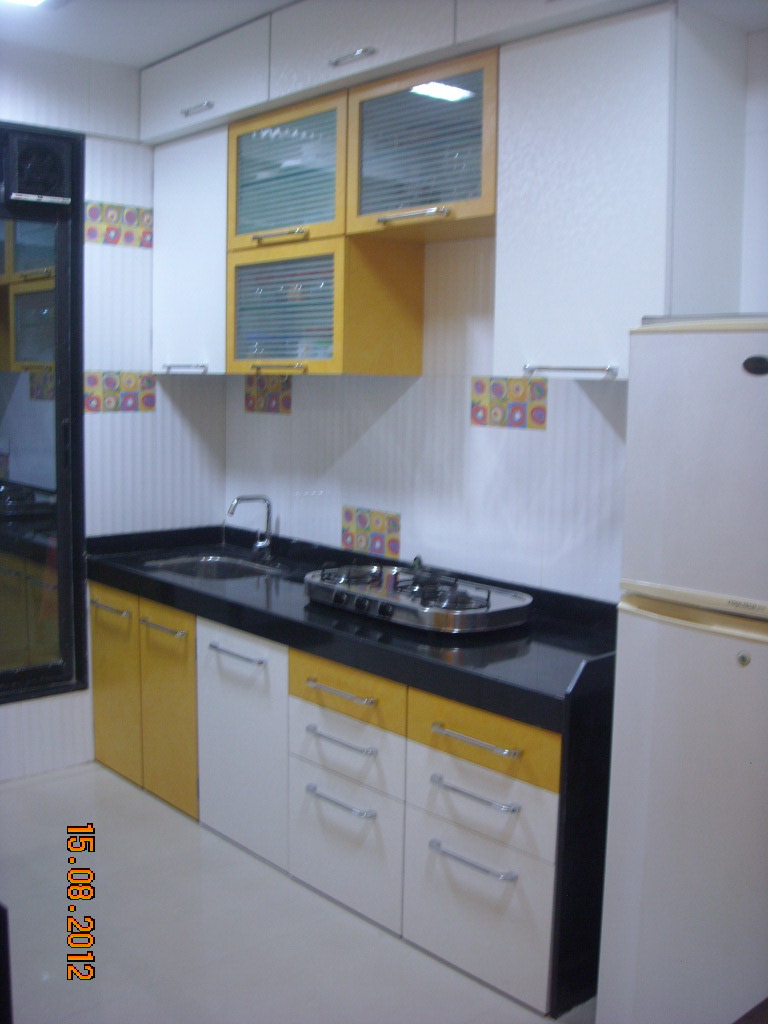 White And Yellow Kitchen by Aparna Mayekar Varadkar Modern | Interior Design Photos & Ideas