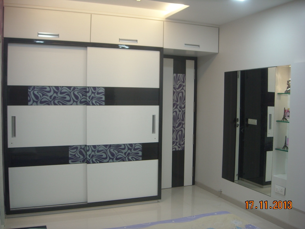 Wardrobe Slide by Aparna Mayekar Varadkar Modern | Interior Design Photos & Ideas