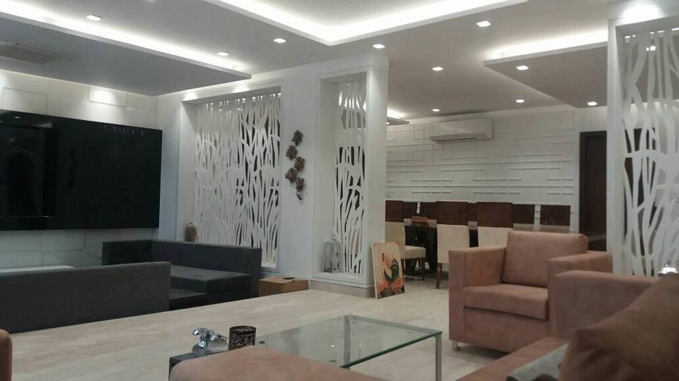 Contemporary living room with centre table by Jamshed Ahmed Living-room Contemporary | Interior Design Photos & Ideas
