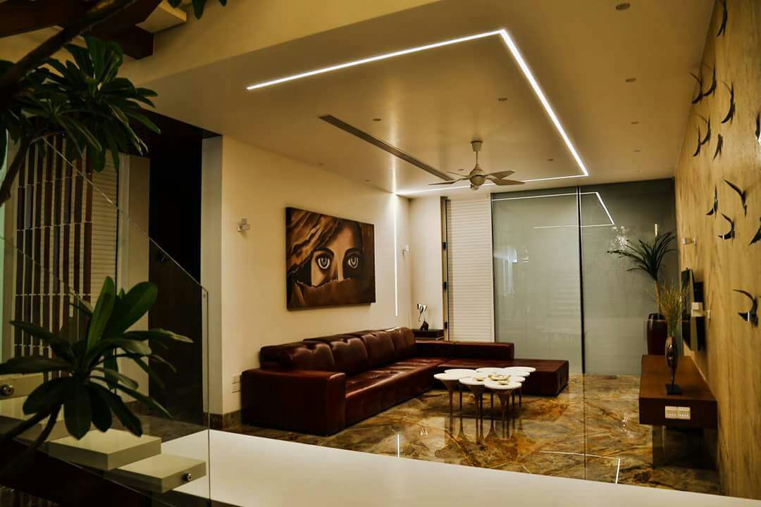 marble floored living room by Chandni Goel Modern | Interior Design Photos & Ideas